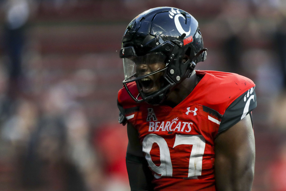 Sep 24, 2022; Cincinnati, Ohio, USA; Cincinnati Bearcats defensive lineman Eric Phillips (97) reacts after sacking Indiana Hoosiers quarterback Connor Bazelak (not pictured) in the second half at Nippert Stadium. Mandatory Credit: Katie Stratman-USA TODAY Sports